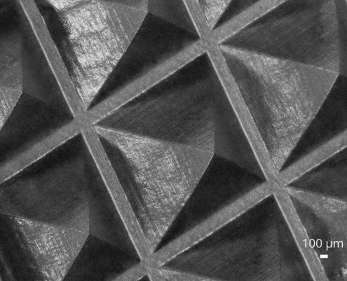 Laser ablation of pyramids in SiC